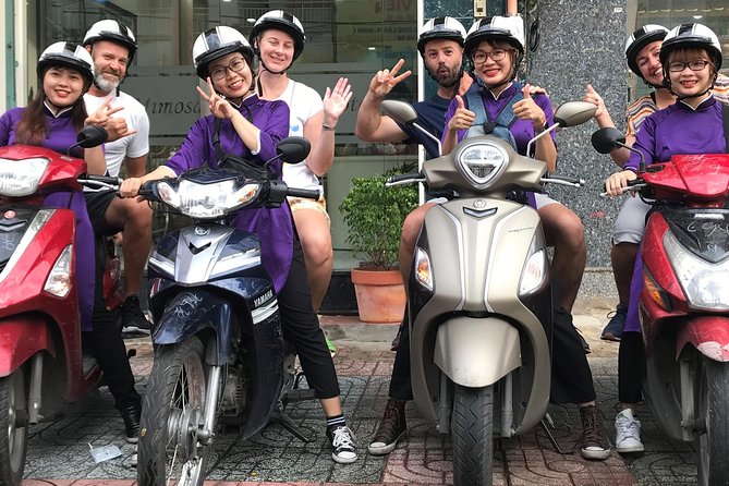 Explore the Unseen Saigon by Night With the Aodai Girls - The Enchanting Nighttime Streets of Saigon