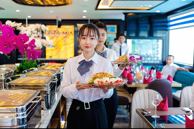 Ha Long Bay Cruise Day Group Tour: Kayaking, Swimming With Lunch - Itinerary Highlights