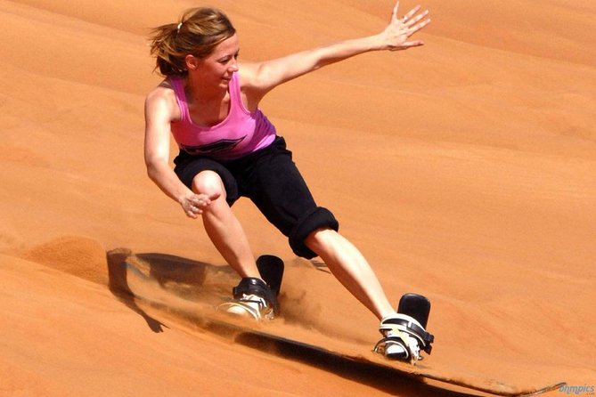 Morning Abu Dhabi Desert Dune Bashing and Camel Ride