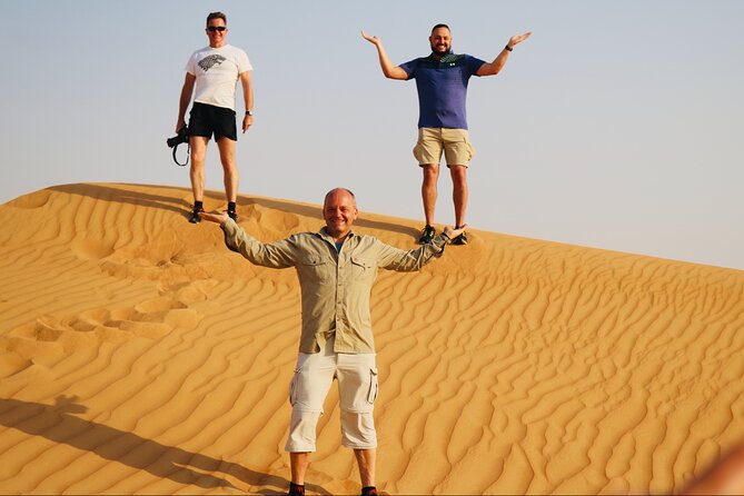 Morning Red Dune Safari With Sand Boarding - Dune Bashing and Sandboarding Experience