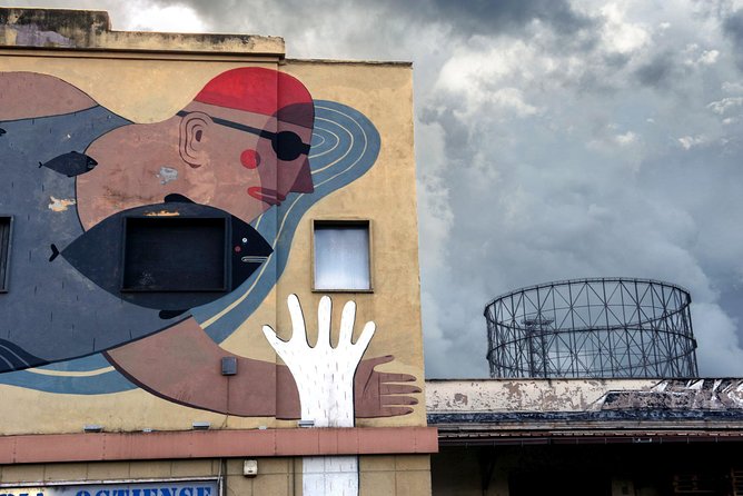 Photo Tour in the Ostiense District: Forfeiture and Redevelopment - Good To Know