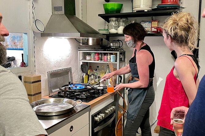 Private Cava Sabrage and Paella Class in Barcelona