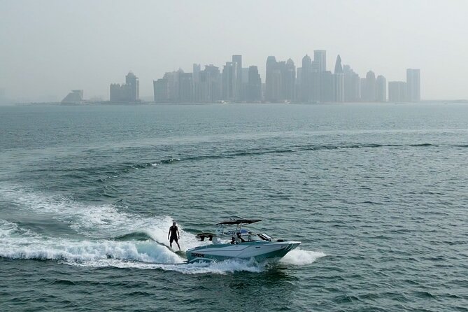 Private Wakesurfing or Wakeboarding Along Dohas Skyline