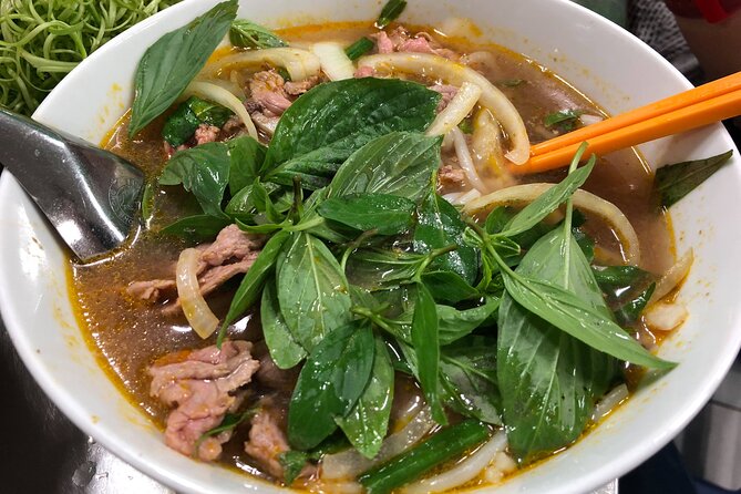 Saigon Night Scooter Experience And Local Food - Tour Highlights