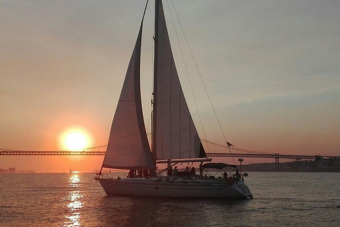 Sailboat Sunset Group Tour in Lisbon With Welcome Drink