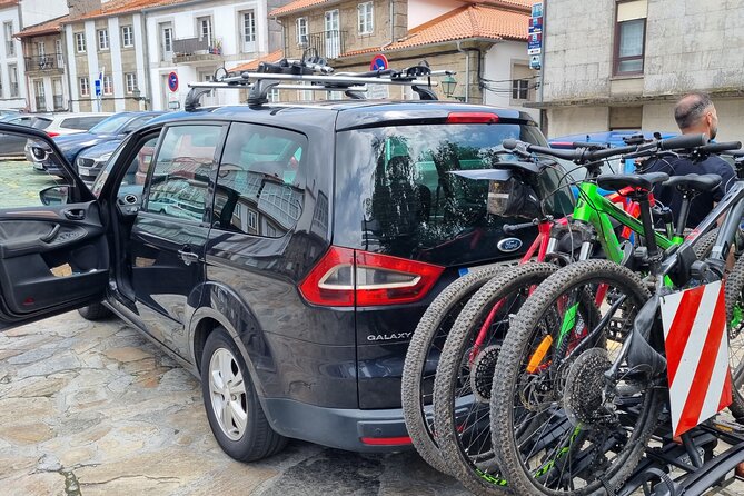 Taxi Bikes Transporting Bicycles and Cyclists From Santiago to Porto