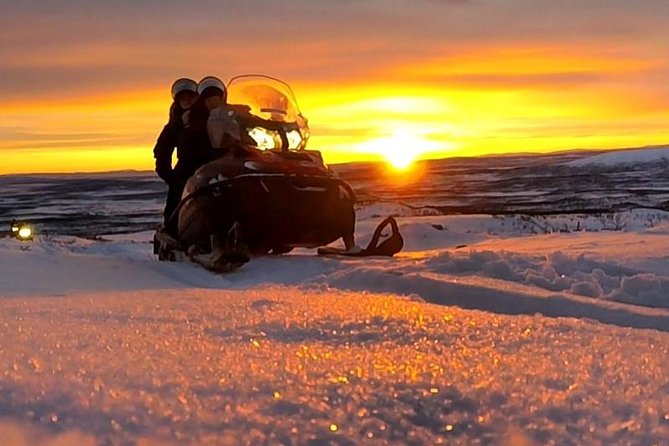 Views Over Lapland by Snowmobile and Visit the Reindeer