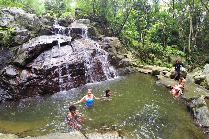 Zip Line Walk to Waterfall & Swimming Mud Pools Combo Tour