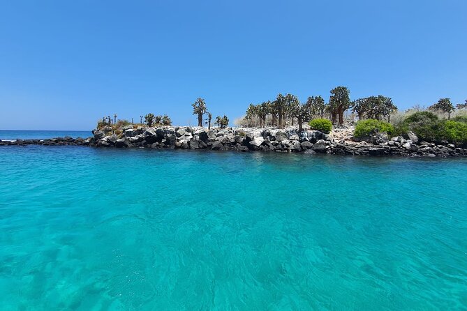 Day Tour to Santa Fe Island and Hidden Beach With Snorkeling and Fishing - Tour Itinerary