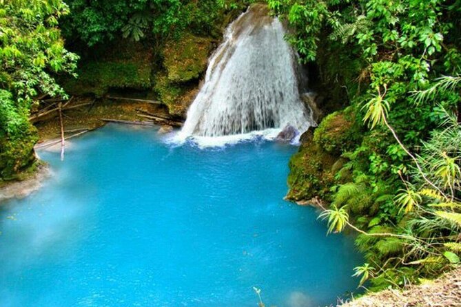 Explore Scenic Tropical Waterfalls at Blue Hole" - Meeting and Pickup