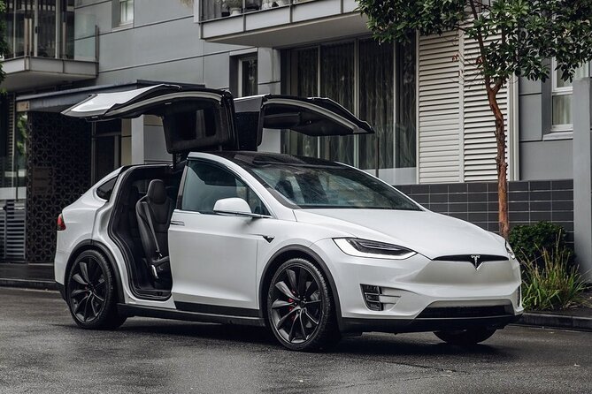 Private Round Trip Honolulu Airport HNL to Beach Resorts by Tesla X, MB E or SUV - Pricing and Booking Details