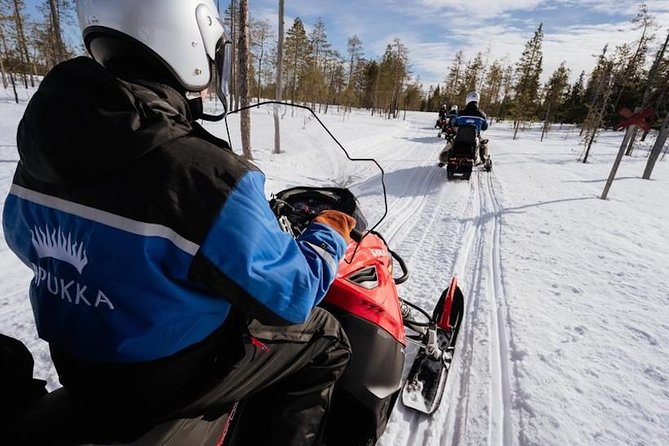 Snowmobiling and Ice Fishing in Apukka Resort, Rovaniemi - Arctic Adventures in Apukka Resort