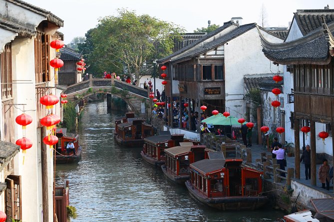 Zhujiajiao Private Day Tour and Shanghai Acrobatic Show - Pricing and Booking Details