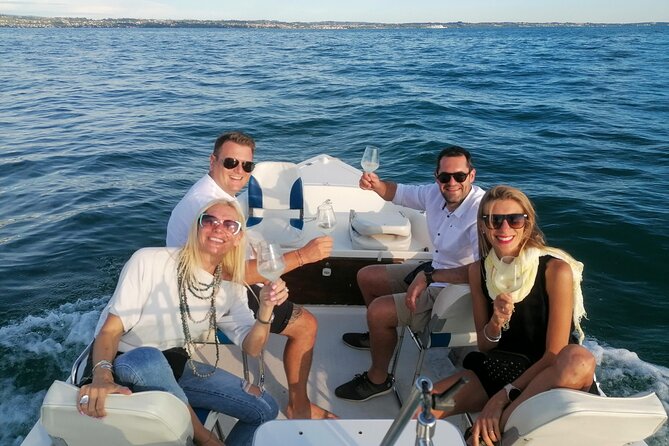 Private Boat Tour With Wine Aperitif From Garda - Itinerary Overview
