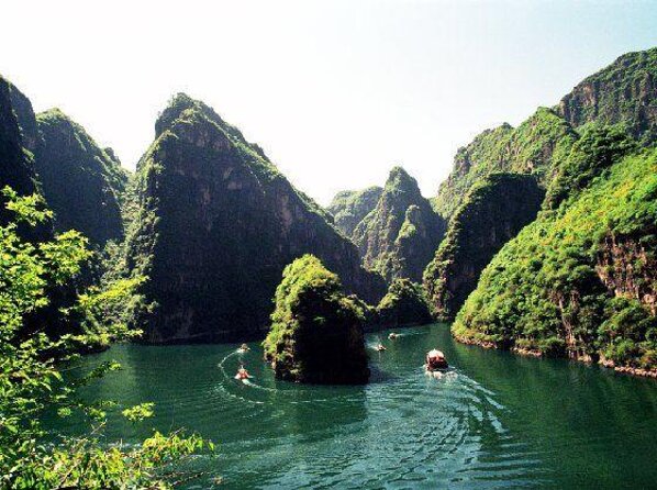 Private Day Tour to Longqing Gorge & Guyaju Cave Including Boat Ride - Itinerary Overview