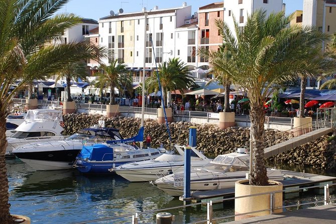 Quarteira Gypsy Market & Vilamoura Marina Half-Day Trip - Explore Quarteiras Famous Market