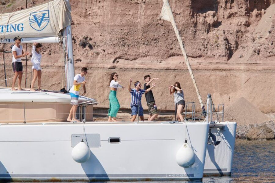 Santorini: Catamaran Day Trip With Snorkel, Meal, & Open Bar
