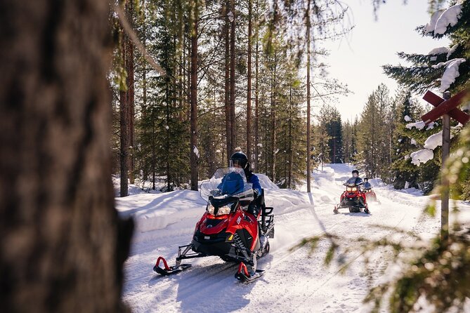 Snowmobiling and Ice Fishing in Apukka Resort, Rovaniemi - Exploring the Winter Landscape on a Snowmobile