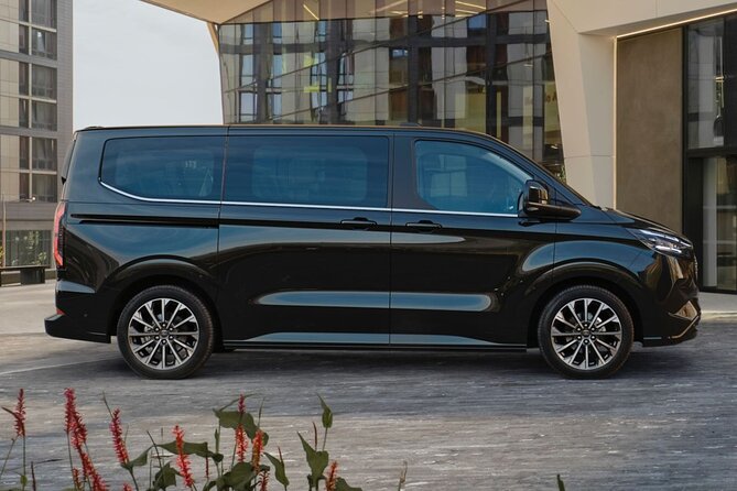 Arrival Private Transfer Dusseldorf Airport DUS to Dusseldorf City by Minivan