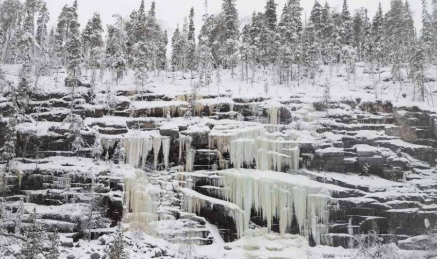Hiking at Korouoma Frozen Waterfall
