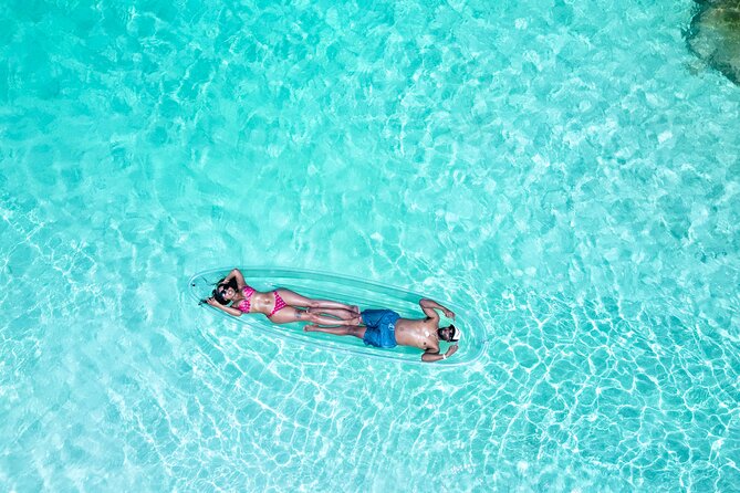 Island Love Stories: Turks & Caicos Clear Kayak Couple Portraits - Capturing Love in Clear Kayaks