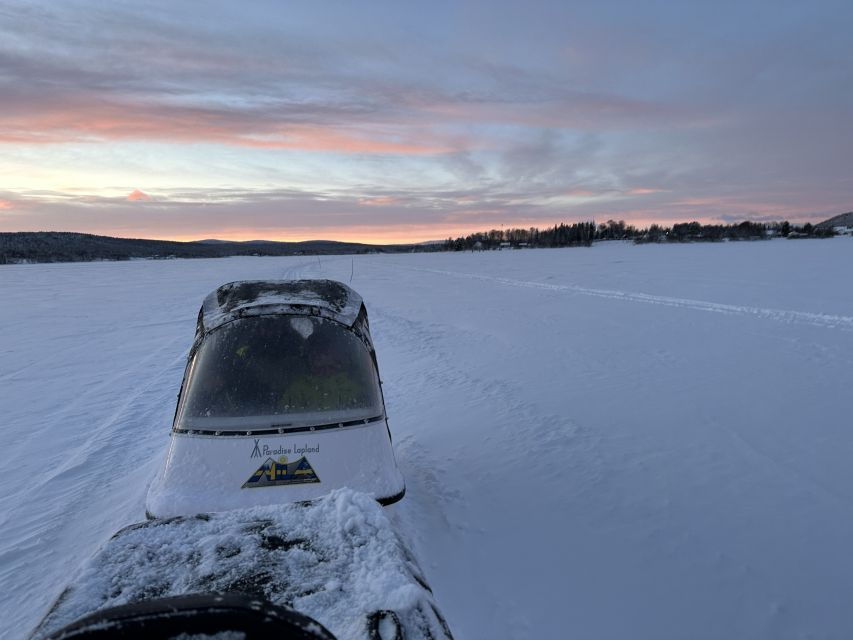 Kiruna: Guided Morning Snowmobiletour (8:30) and Fika
