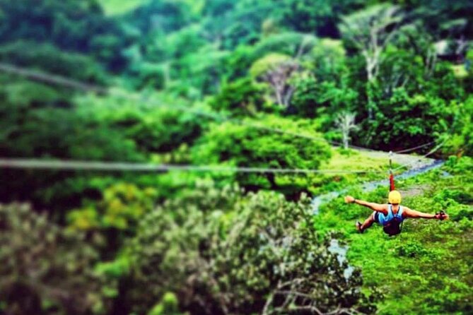 Mountain and Ocean View Waterfall Zipline Tour in Jaco Tractor Jungle Tour