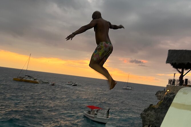 Negril Private Day Tour: ATV Ride, Party Catamaran & Ricks Cafe