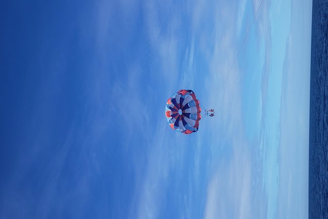 Parasailing Thrills Await at West Bay Beach