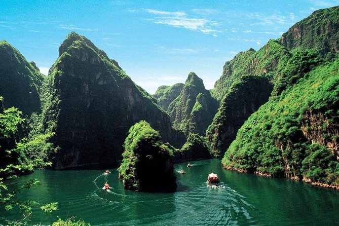 Private Day Tour to Longqing Gorge & Guyaju Cave Including Boat Ride