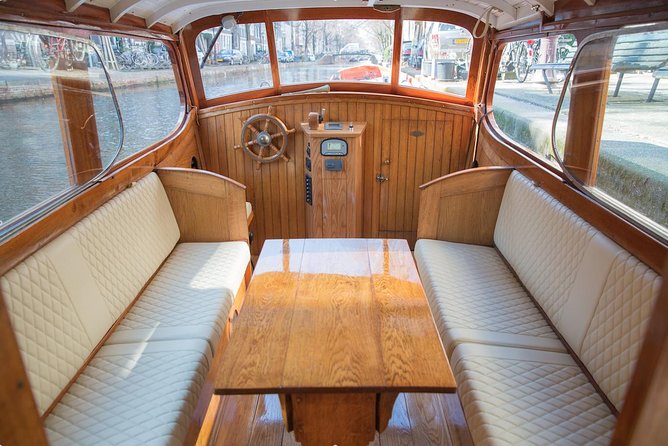 Private Guided Historic Amsterdam Canal Cruise in a Salon Boat - Private Guide and Cultural Insights