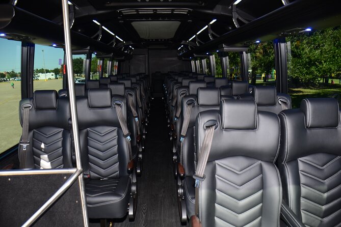 Transfer in 39 Passenger Bus From Msy/Port to Downtown - Booking Confirmation Process
