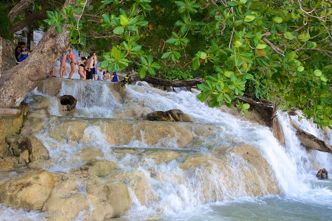 Dunns River Falls, Zipline, Bamboo Rafting & Horseback Tour - Dunns River Falls Experience