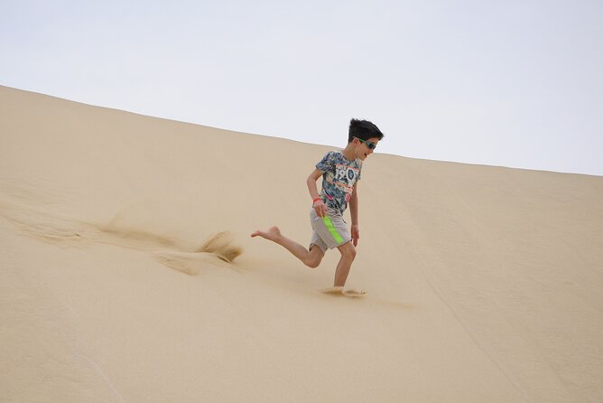 Sandboarding Adrenaline on the Dunes - Booking Your Sandboarding Experience