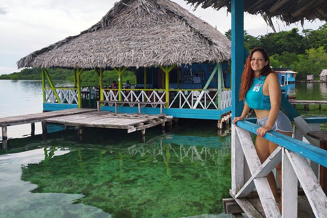 Dolphin Bay and Coral Cay With Drinks Private Tour in Zapatilla