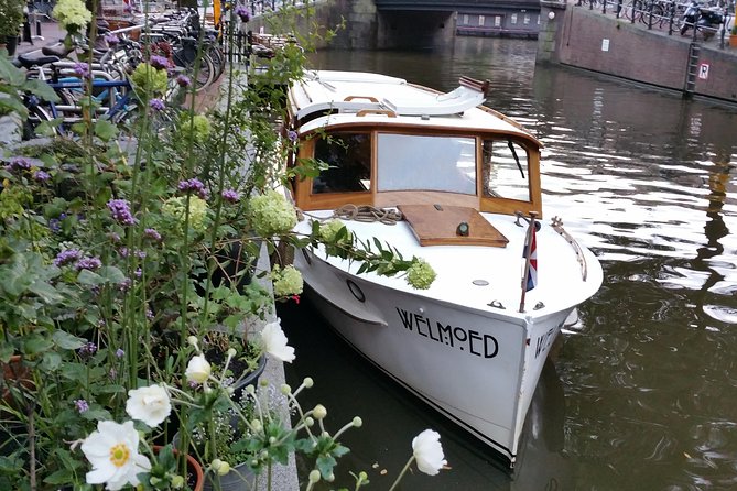 Private Guided Historic Amsterdam Canal Cruise in a Salon Boat
