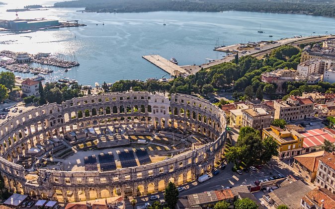 Day Trip to Poreč and Pula With Lunch From Rovinj - Itinerary Highlights
