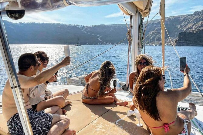 Santorini Catamaran Day Cruise: Lunch, BBQ, Open Bar, Transfers - Booking Details