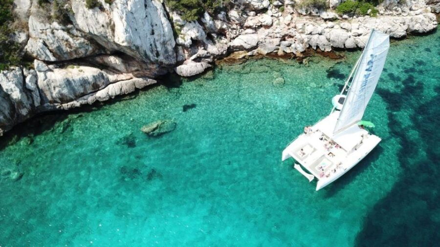 Alghero: Full Day on a Catamaran in Porto Conte Natural Park