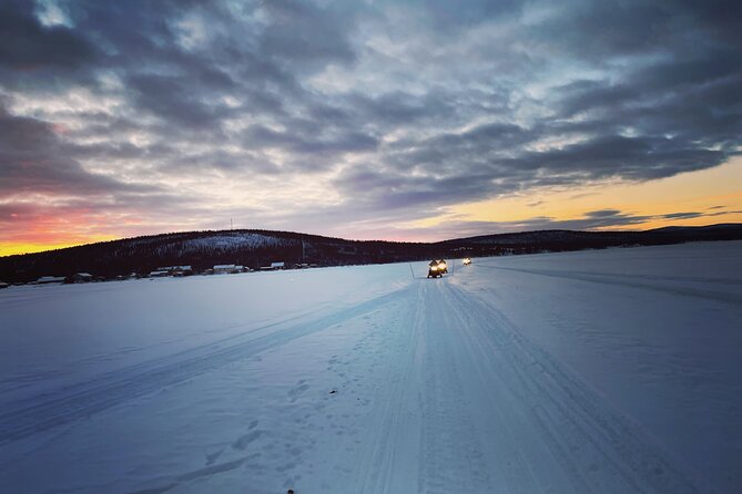 Day Tour With Snowmobile in Kiruna