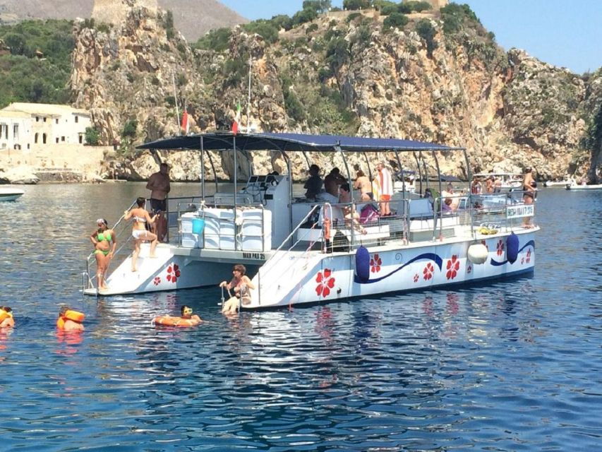 In Catamaran to Reserve Zingaro and Faraglioni Scopello