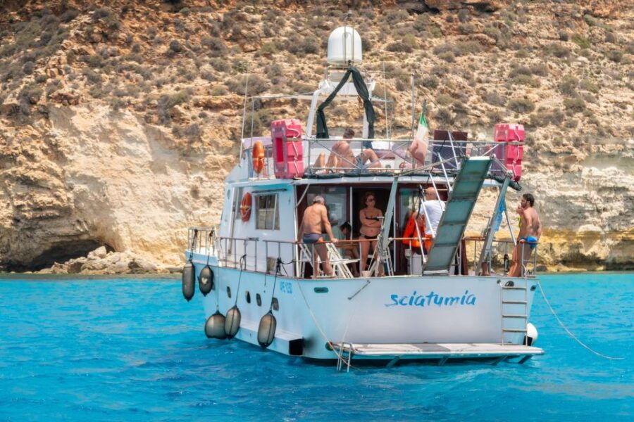 Lampedusa: Yacht Excursion, Swimming Stops, and Typical Lunch - Pricing and Duration