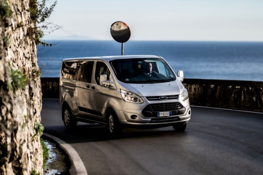 Positano: Shared Shuttle Transfer to Naples Train Station