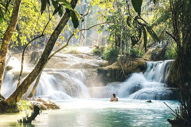1 DAY Mekong Cruise to Pak Ou Caves. Kuang Si Waterfalls . Local Villages - Upgrade Options