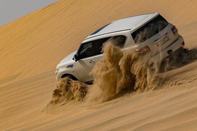 Doha Half Day Desert Safari Dune Bashing Camel Ride Sandboarding - Tour Overview