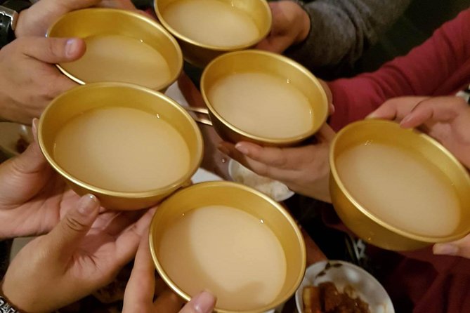 Immersive Korean BBQ, Market, and Secret Pub Experience in Seoul - Sip on Traditional Korean Drinks