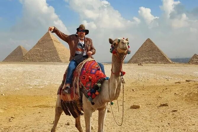 Giza Pyramids, Sphinx and Camel Ride Half Day Tour