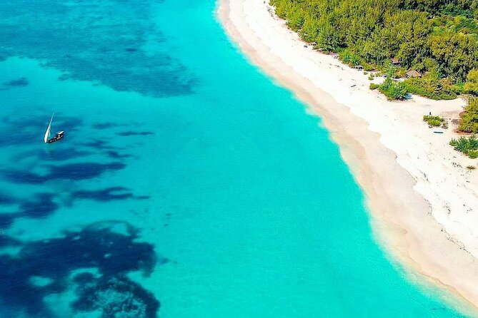 Mnemba Dolphin Tour, Kuza Cave, Paje Beach, The Rock Restaurant, Jozani Forest - Pickup Details