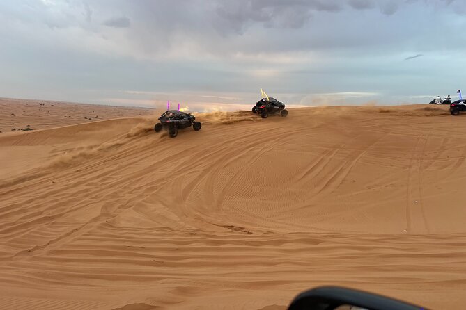 Morning Red Dune Desert Safari Camel Ride and Sandboarding - Pickup Details