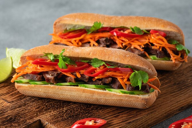 Saigon By Night and Vietnam Local Food on Motorbike - Tour Highlights